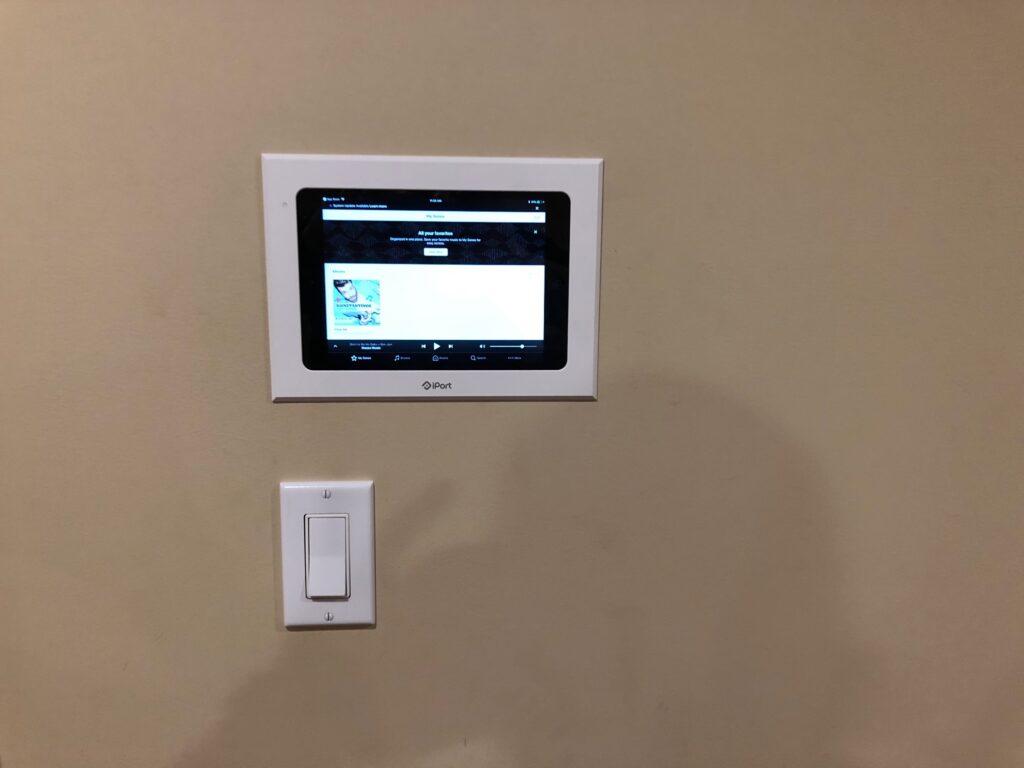 This is the after! The ipad  seamlessly fits in the wall and now the client has easy access to play their Sonos music all over the house.